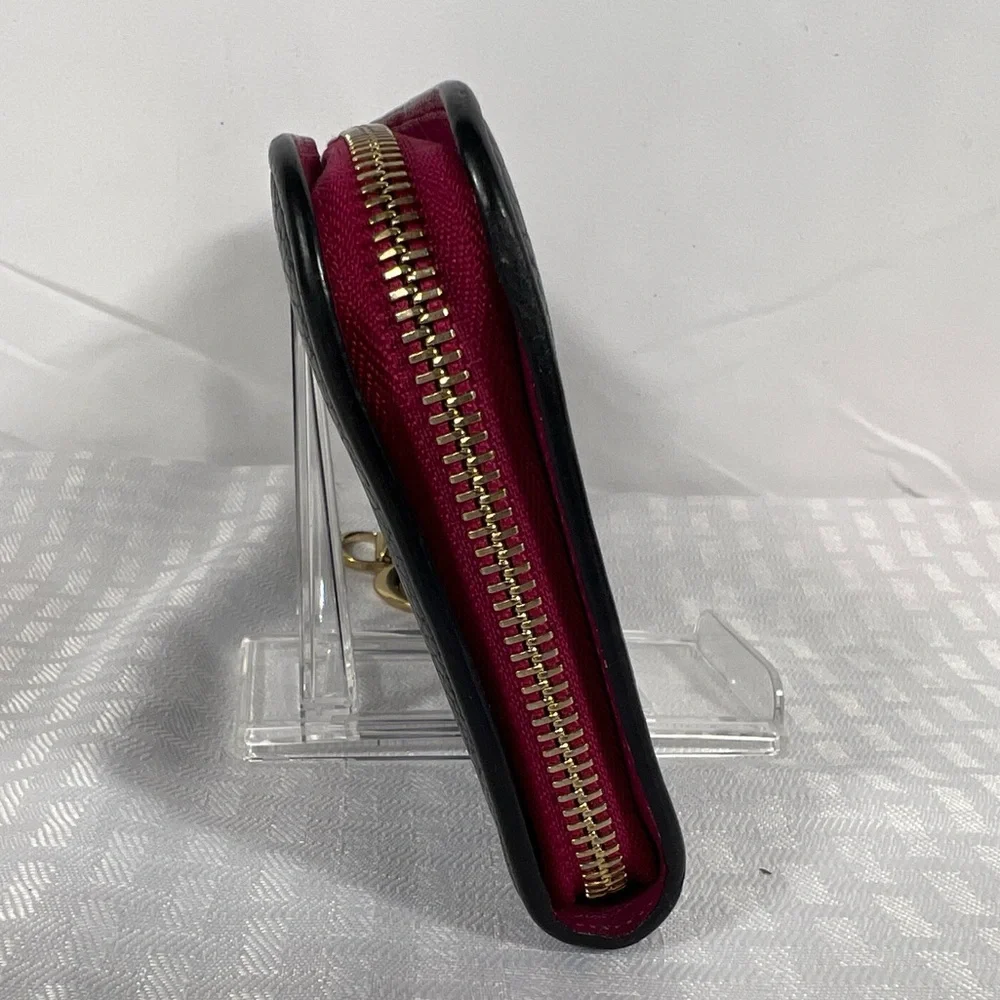 1009: Christian Dior Pebbled Leather Zip Continental Wallet, Fuchsia Int